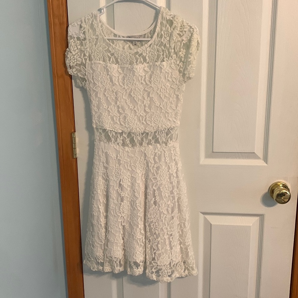 White lace dress with a shear belly piece